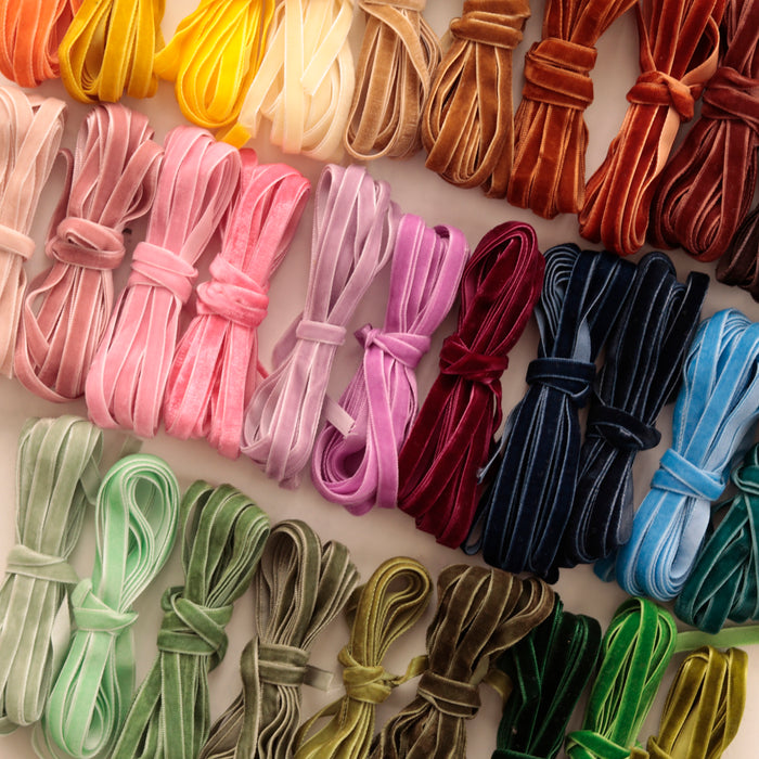 Narrow velvet ribbon in curated color palette for bridal bouquets and invitation suites