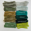 Hand dyed velvet ribbon in curated green palette for bridal bouquets and invitations